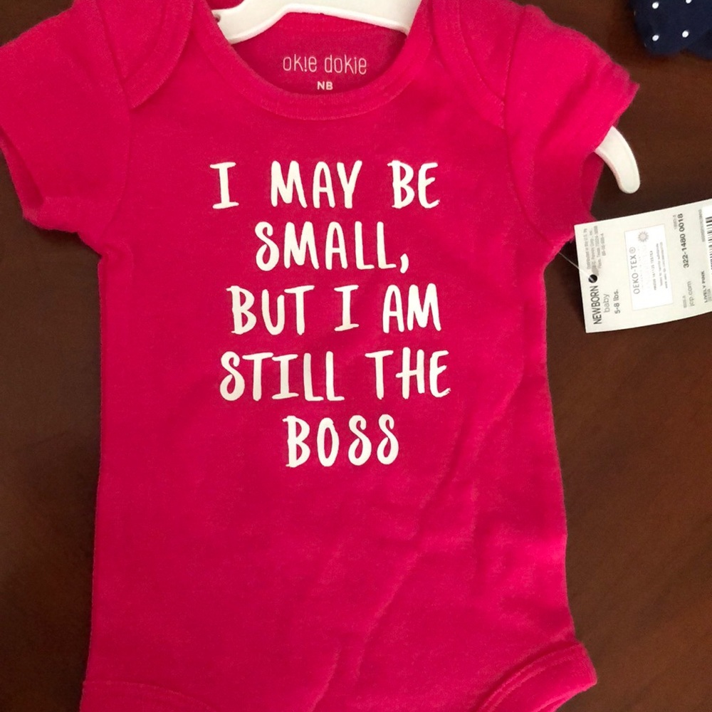 Newborn pink onesie